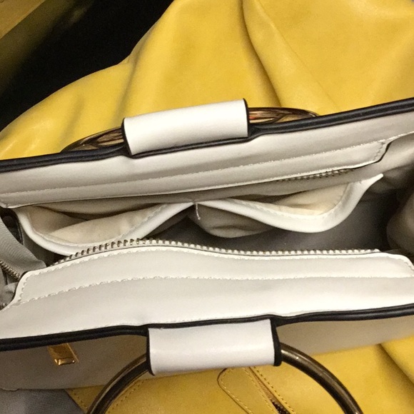 The non leather Acilla by Aldo is in like new condition.  Stores in 5/areas. - Picture 5 of 5